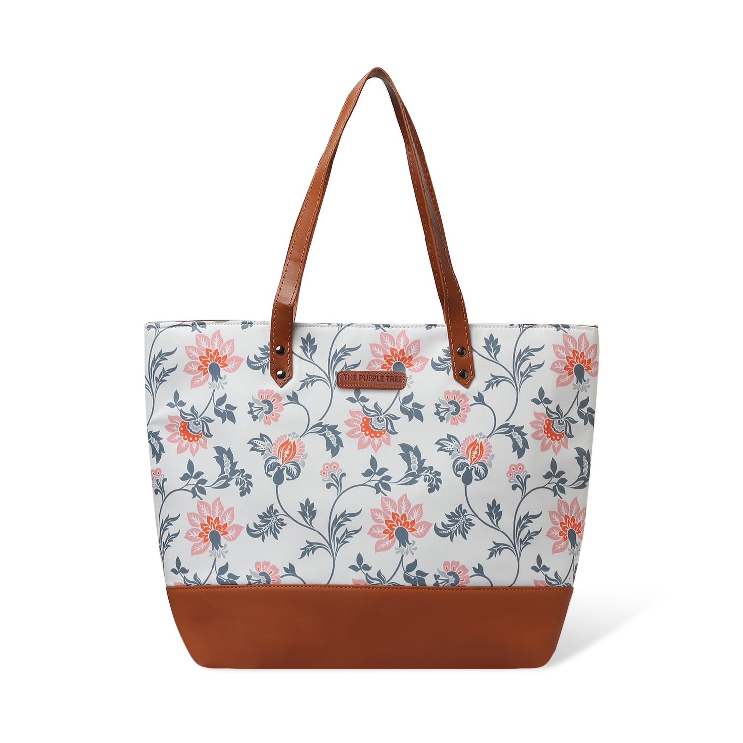 1. A colorful floral tote bag resting on a chair.