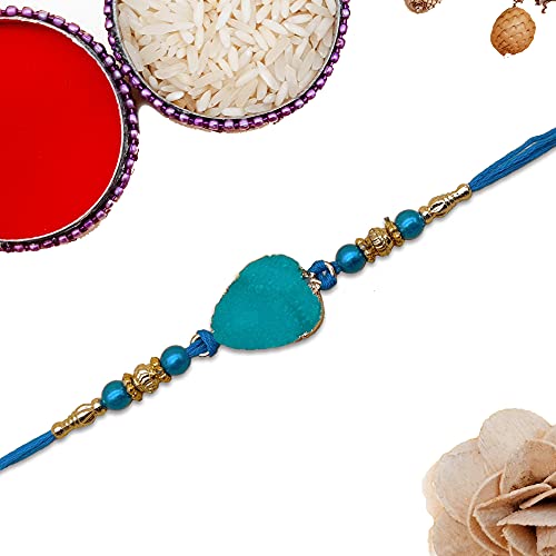 Celebrate Raksha Bandhan with this beautiful blue heart-shaped rakhi and gold chain.