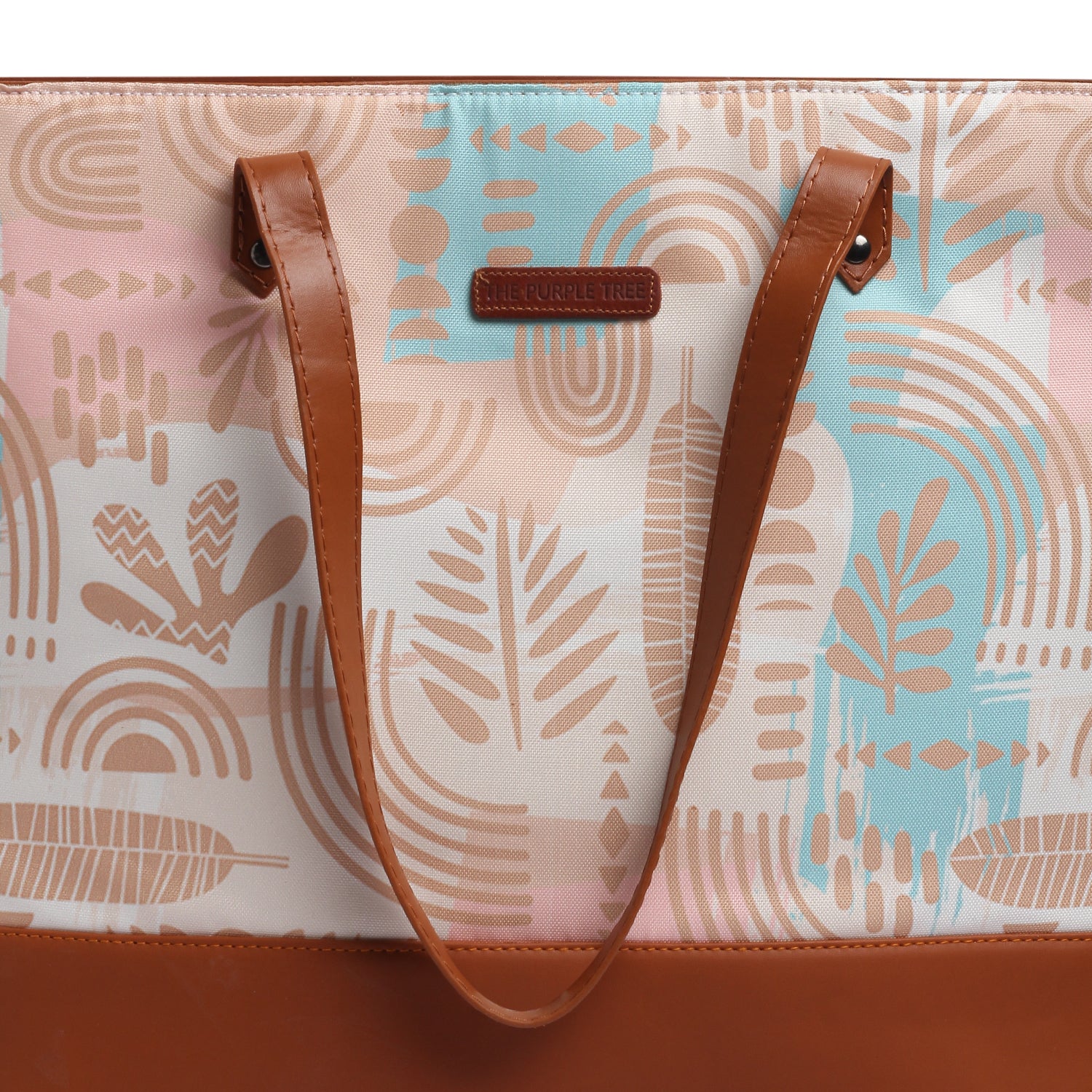 A stylish tote bag with a light blue and pink pattern, perfect for adding a pop of color to your outfit.