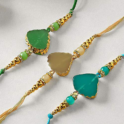 Gold chain attached to a lovely blue heart-shaped rakhi, ideal for Raksha Bandhan.