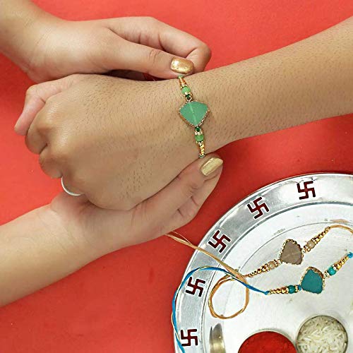 Three green and gold rakhi with beads, traditional Indian bracelets for Raksha Bandhan.