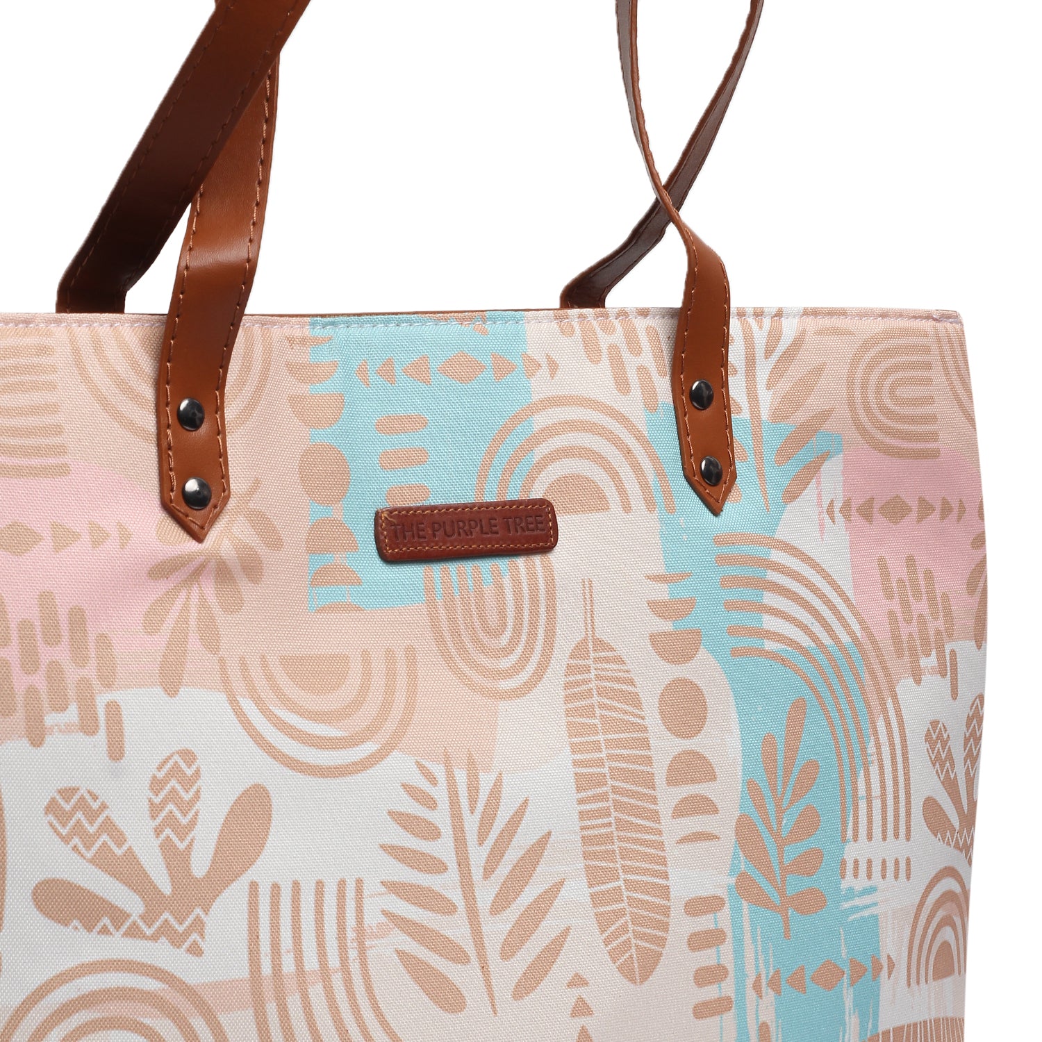 Fashionable tote bag in a light blue and pink pattern, a must-have accessory.