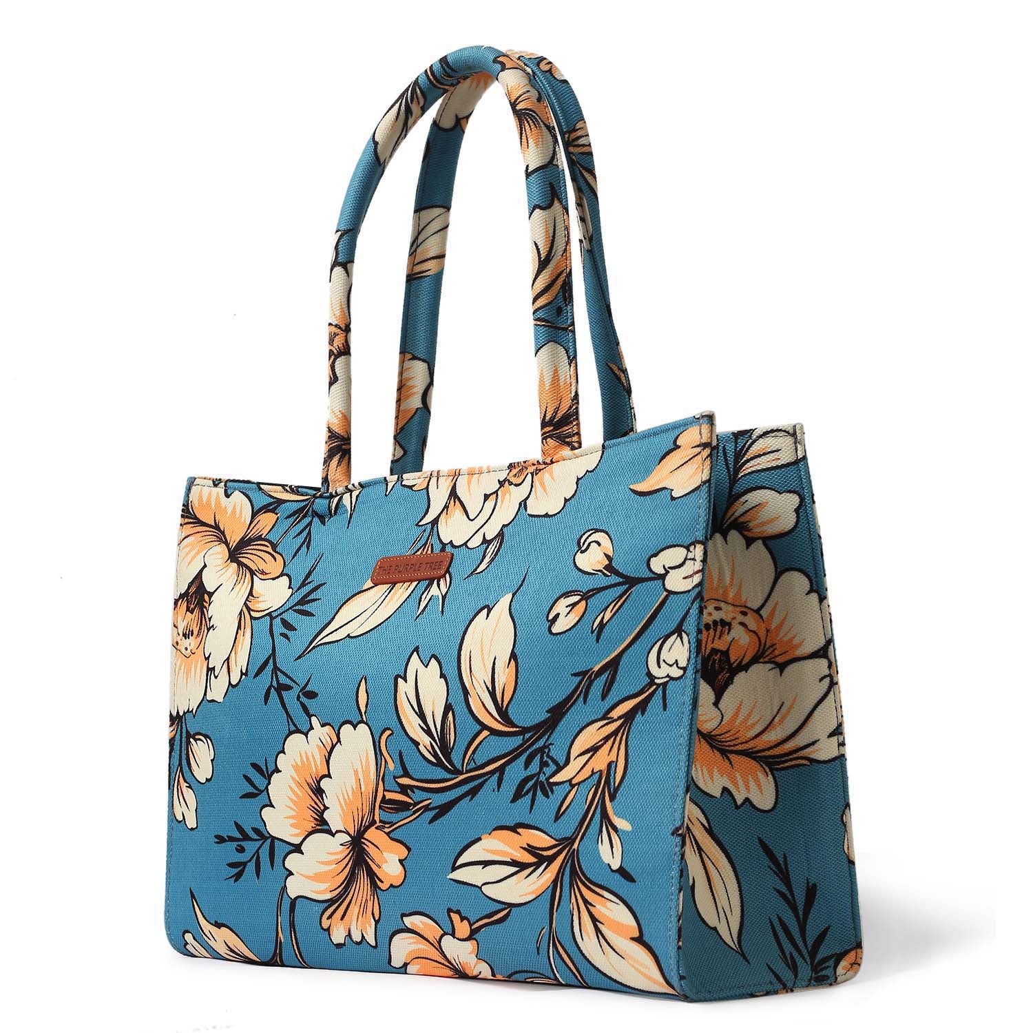 Stylish tote bag featuring floral print, book, and notebook.