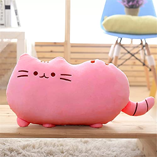 Pink cat-shaped pillow on wooden table.