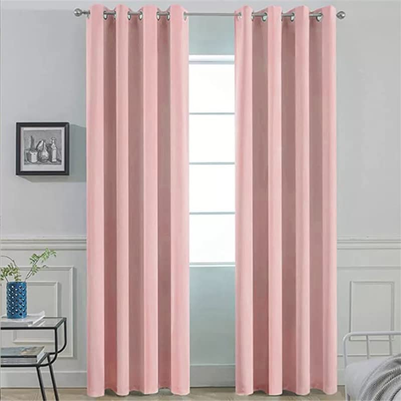 Up-close view of pink curtain adorned with bow.