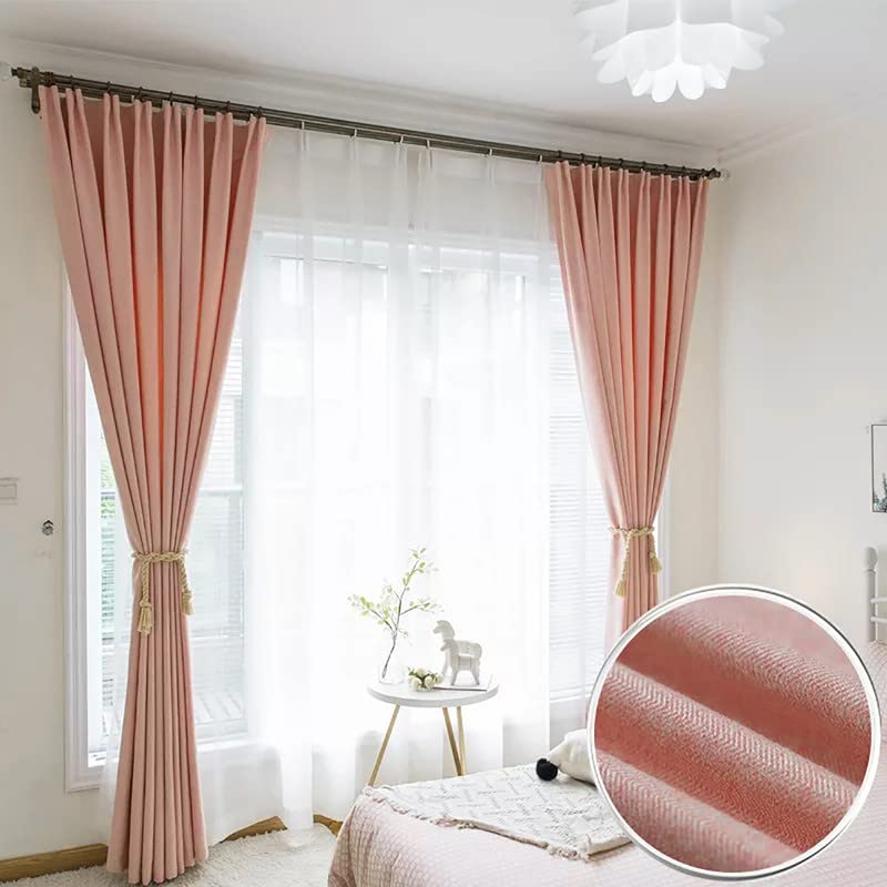 Detailed shot of pink curtain with bow.