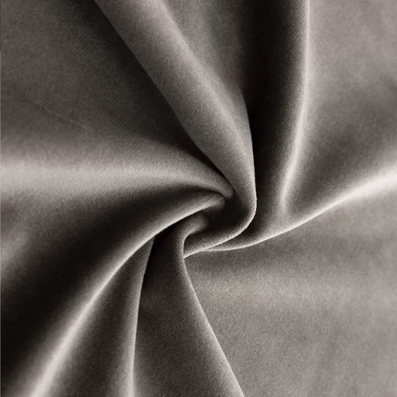  Close-up of chocolate bars on gray fabric.