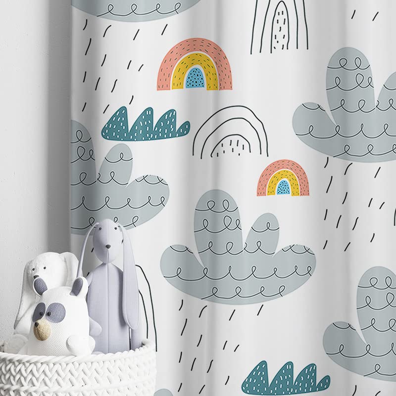 White curtain showcasing bright rainbows and fluffy clouds.