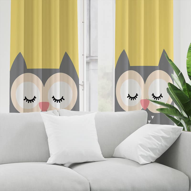 Yellow and gray curtain with owl motif, creating a serene atmosphere.