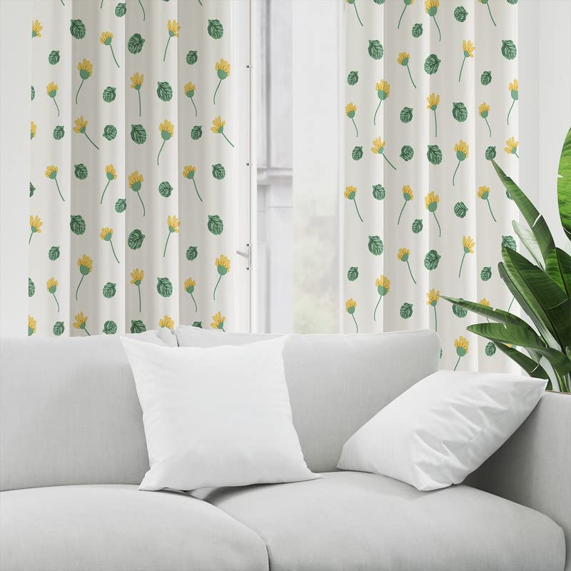 Brighten up your space with a yellow and green floral print curtain adorned with delicate leaves.