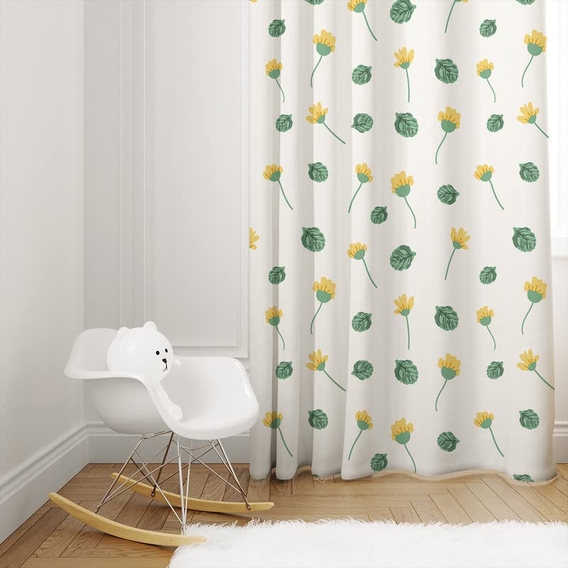 Vibrant yellow and green curtain featuring a floral print with leaves, perfect for a botanical theme.