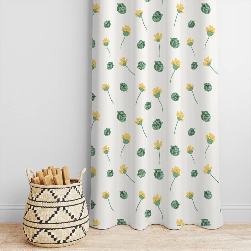 A vibrant curtain with yellow and green floral print, adorned with beautiful leaves.