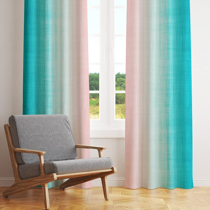 Pink and blue curtain hanging against a white wall.