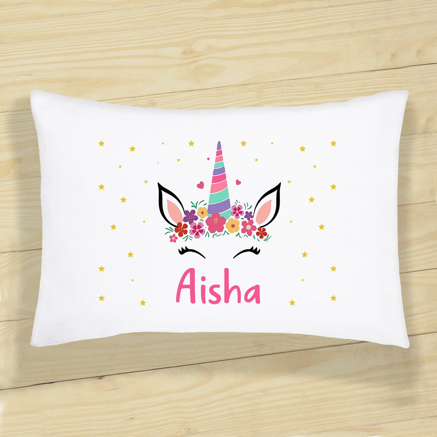 Custom unicorn pillow featuring a colorful mane and shimmering horn, ideal for adding a whimsical touch to your decor.