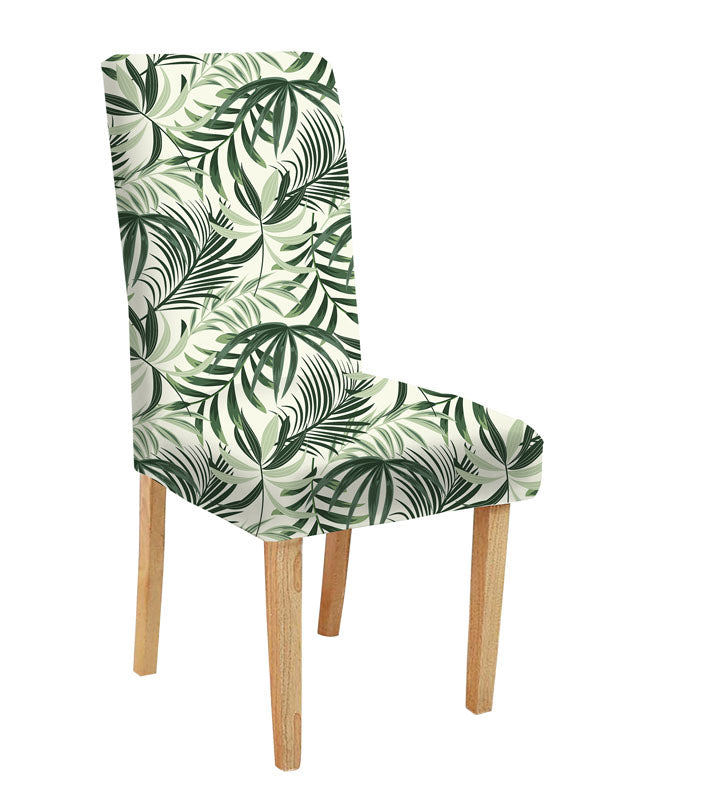 Green and white chair with palm leaf print, perfect for adding a tropical touch to any room.