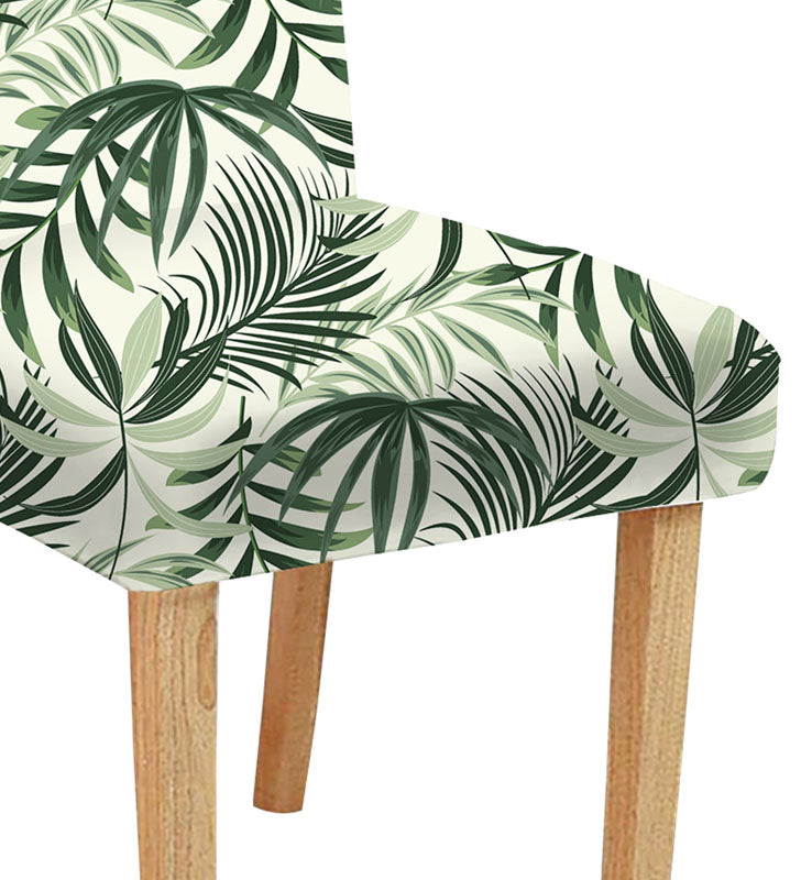 Stylish green and white chair featuring a trendy palm leaf design, ideal for a modern decor.