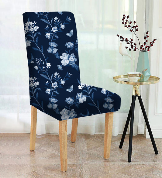  A chair with a colorful floral pattern, adding a touch of elegance and charm to any room decor.