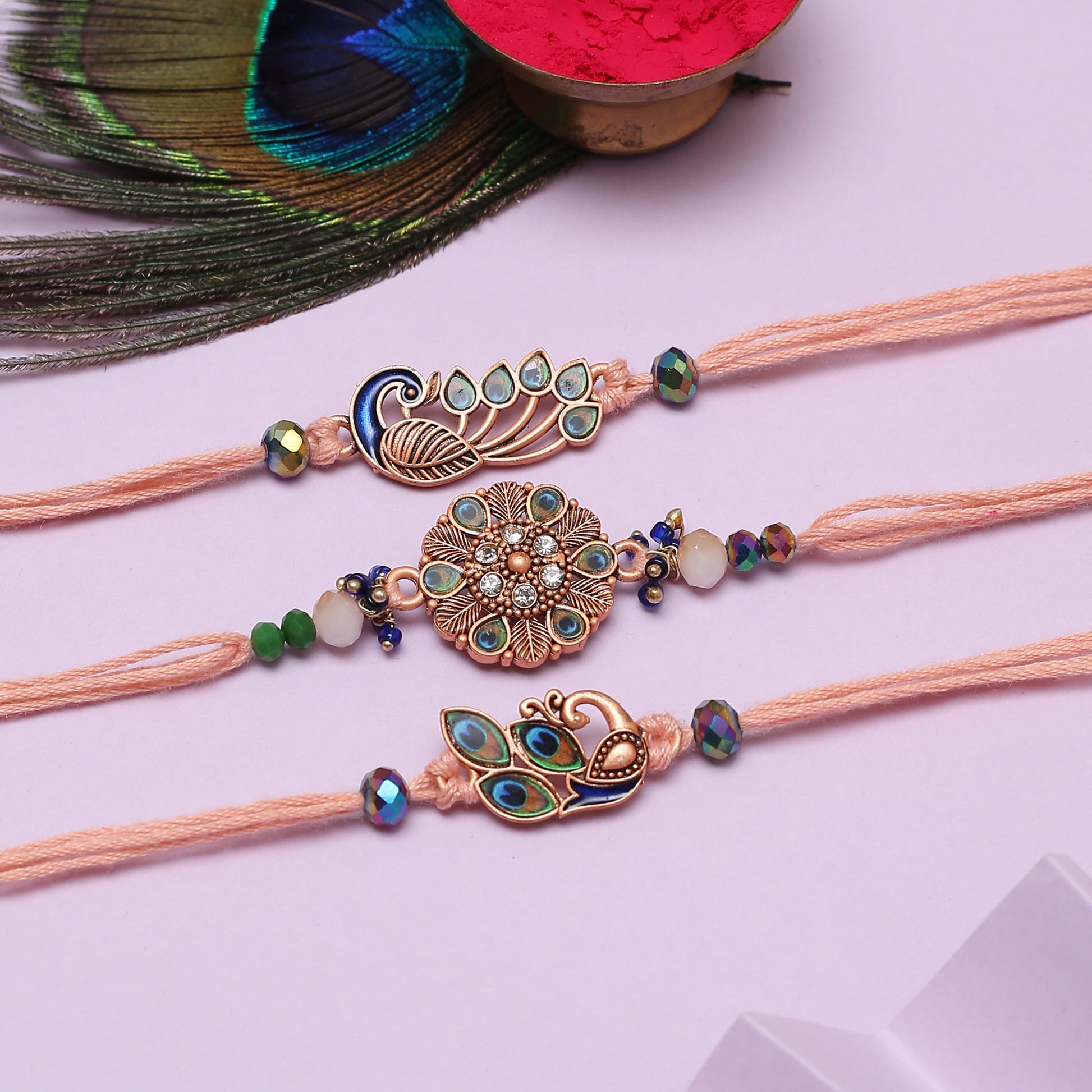 Colorful rakhi's with a peacock feather, showcasing the festive spirit and sibling bond of Raksha Bandhan.