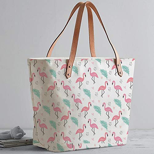  Stylish tote bag featuring a fun pink and green flamingo print, ideal for a day out.