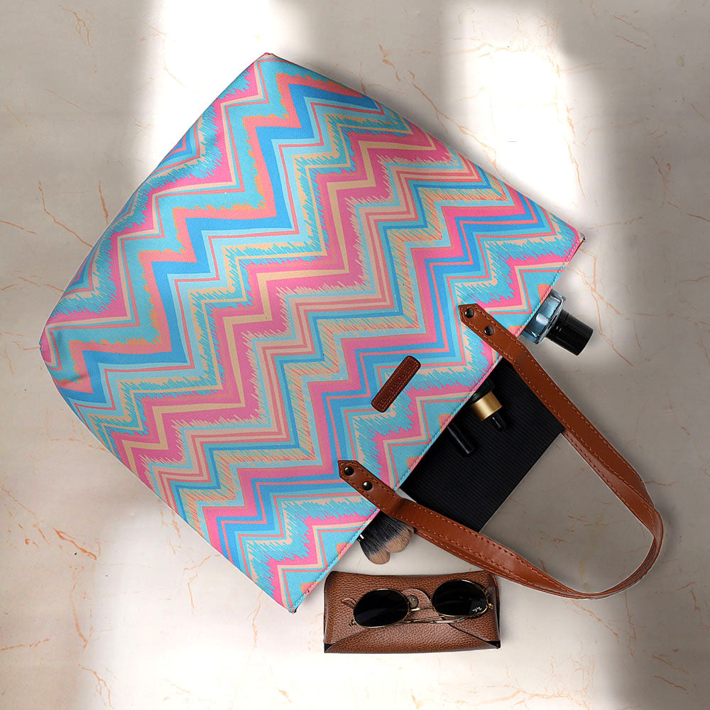 Vibrant zigzag design tote bag, ideal for carrying your essentials in style.