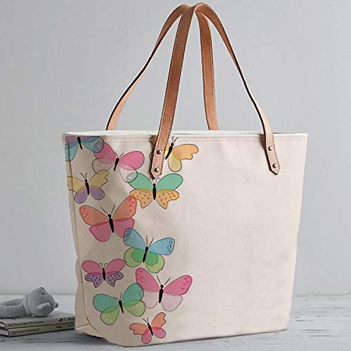 Large tote bag featuring a playful butterfly pattern, great for a casual day out or shopping trip.