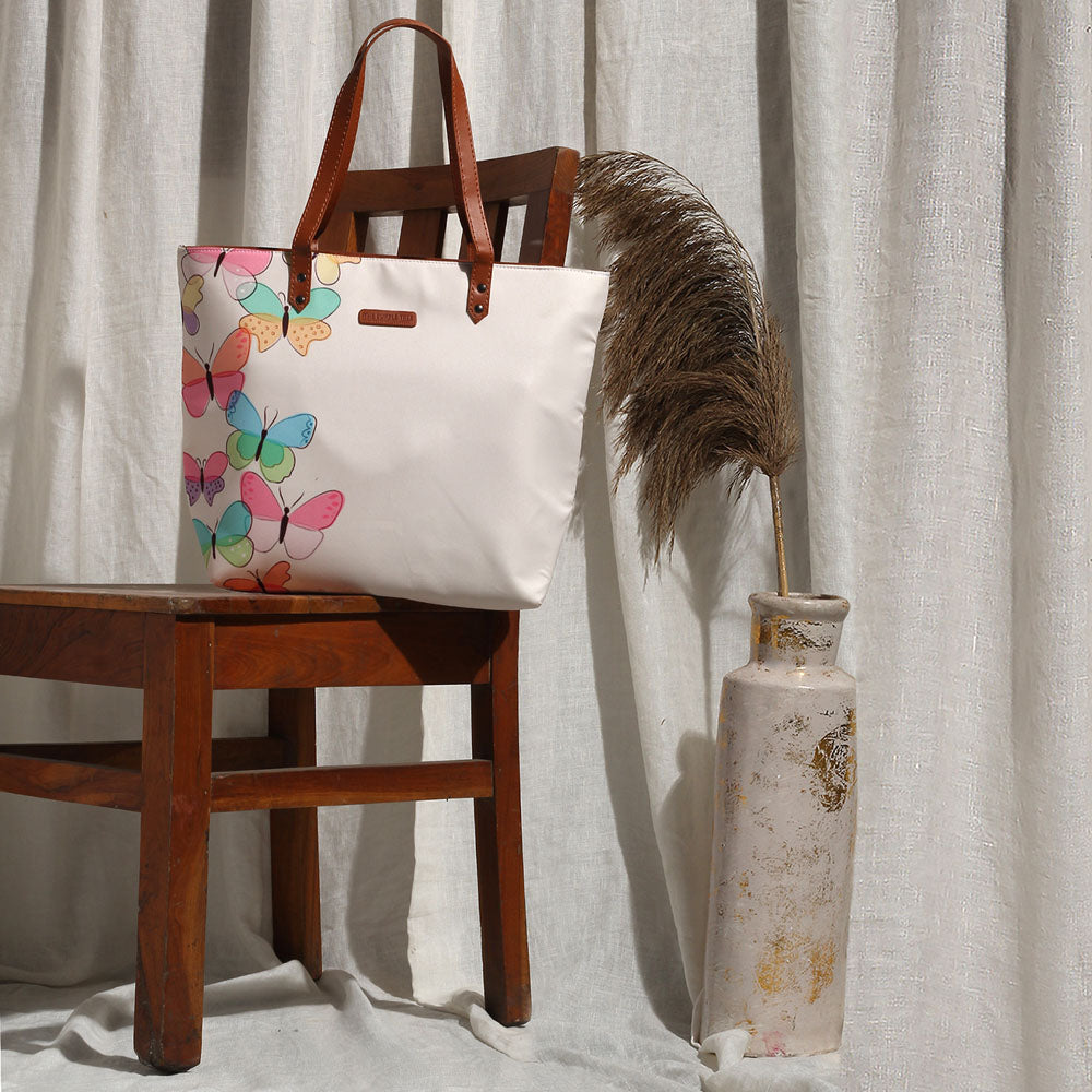 Butterfly patterned tote bag, a chic and practical accessory for any occasion.