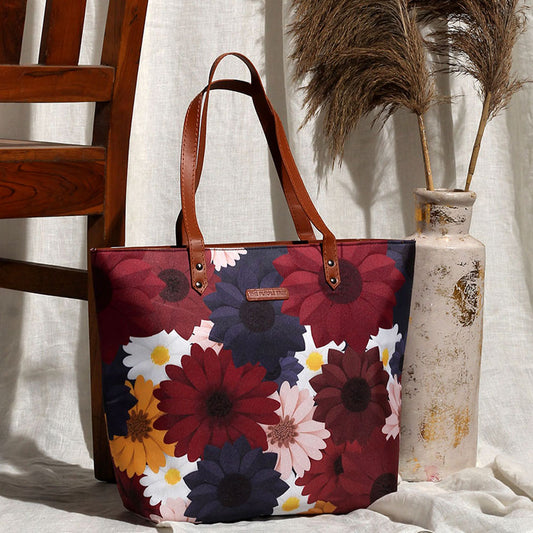 A stylish tote bag with a beautiful floral print, perfect for carrying your essentials in style.