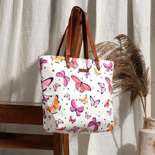  Colorful butterfly print tote bag, perfect for carrying essentials in style.