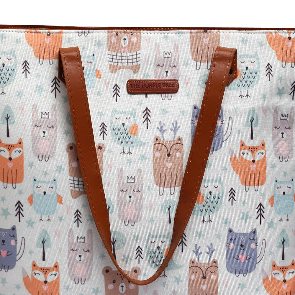 A stylish white tote bag adorned with a cute animal pattern, appealing to animal lovers.