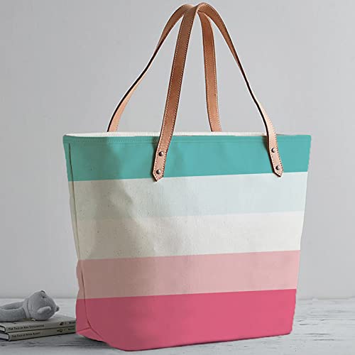 Large tote bag in pink, blue, and white stripes, a fashionable accessory for any casual or beach look.