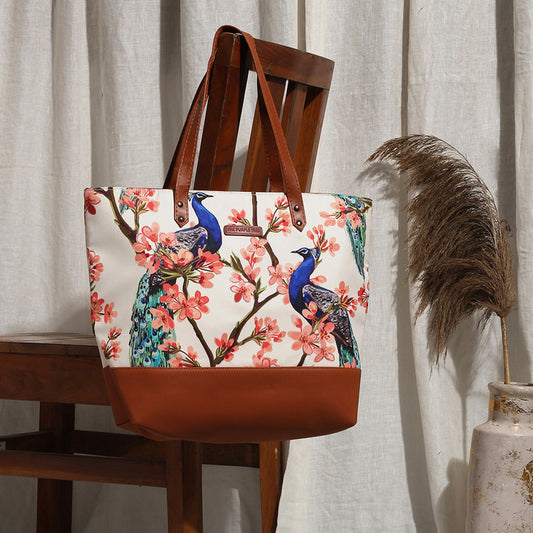  A stylish tote bag featuring colorful birds in flight, perfect for carrying all your essentials.