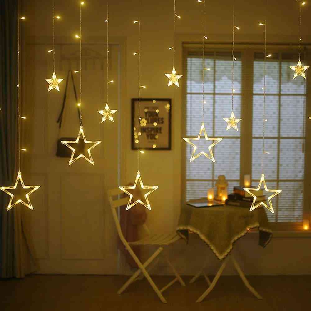 Decorative lights hanging from above, illuminating the room with a soft glow.