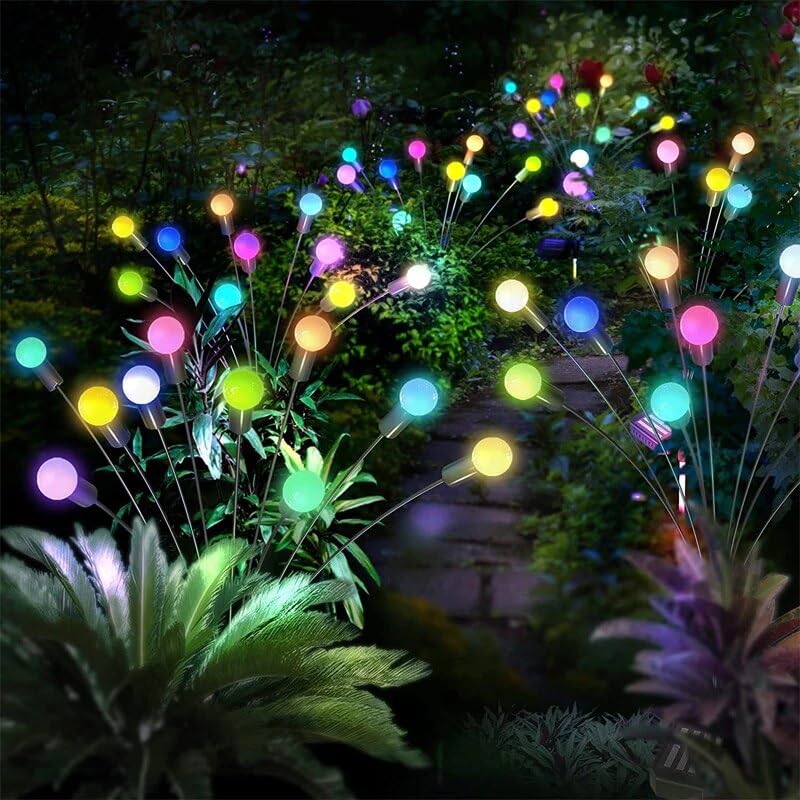 Bright solar garden lights adding a pop of color to the outdoor space.