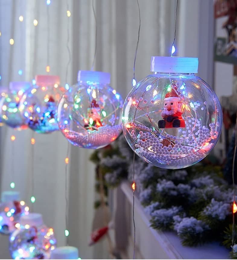 Colorful string of Christmas lights dangling from above, adding a warm glow.