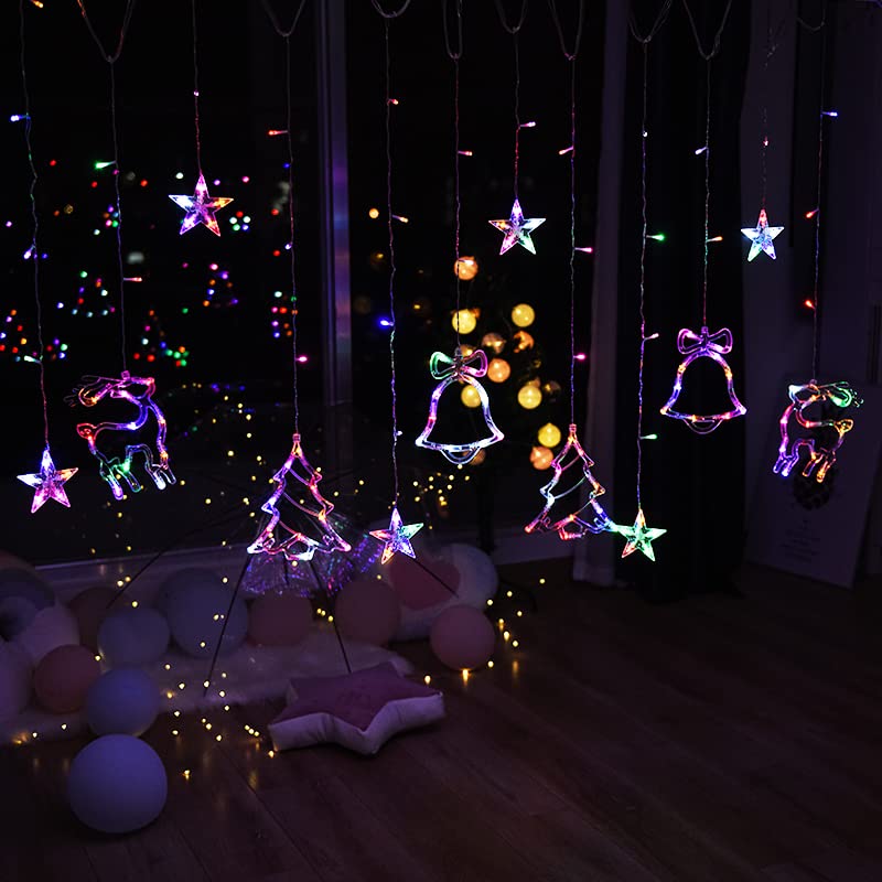 Festive room with Christmas decorations and twinkling lights.
