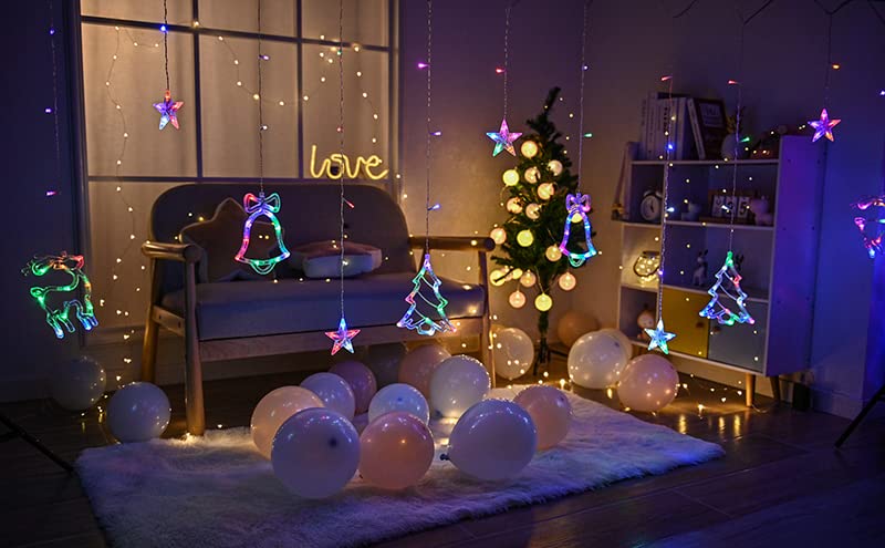 Room adorned with Christmas decor and sparkling lights.