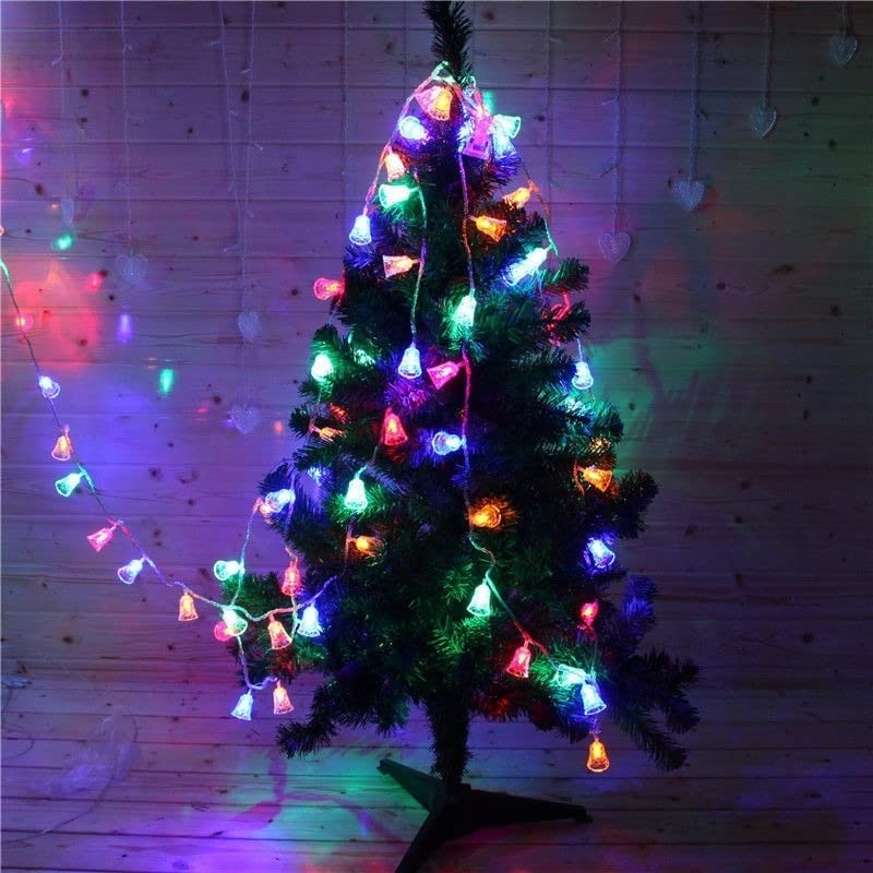 A festive Christmas tree adorned with twinkling lights and colorful decorations.