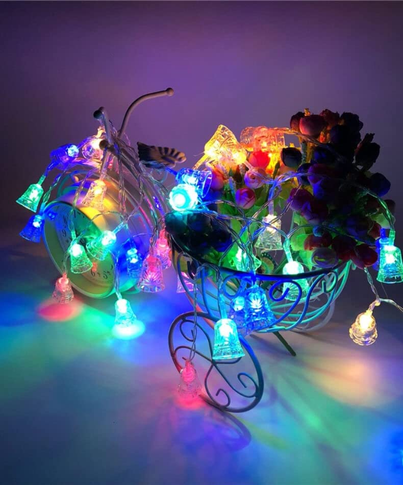 A bike featuring lights and flowers in the basket.