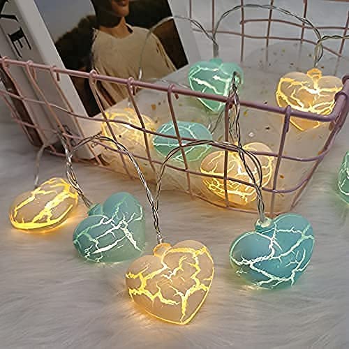 Colorful heart-shaped lights strung together, perfect for adding a touch of romance to any space.