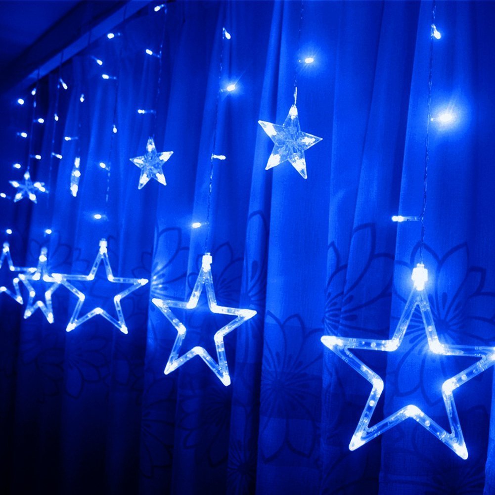 Blue star curtain with twinkling lights, perfect for adding a magical touch to any room decor.
