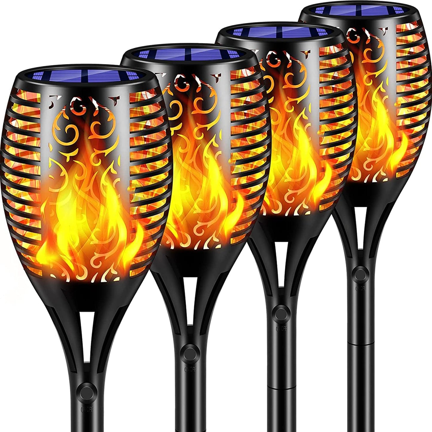 Four black solar powered flaming wine glasses on a table.