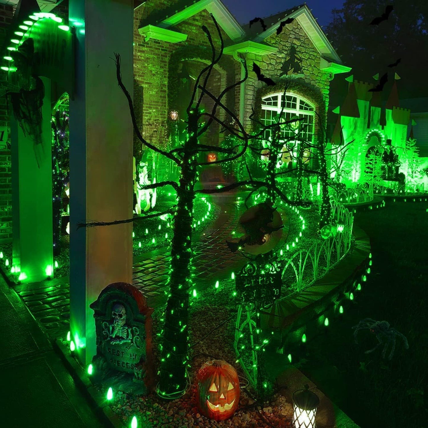 Halloween-themed house with glowing green lights.