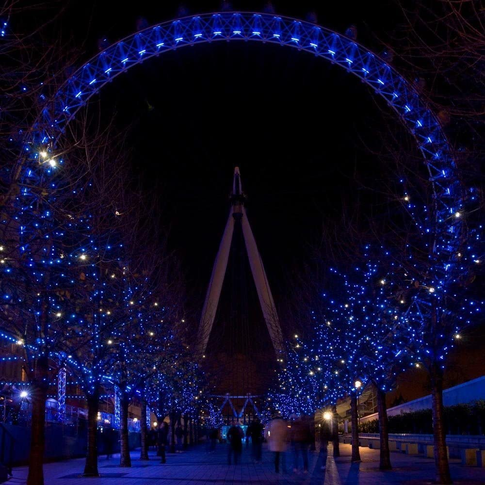 Blue LED Christmas lights shining brightly on a festive tree, creating a magical and enchanting atmosphere.