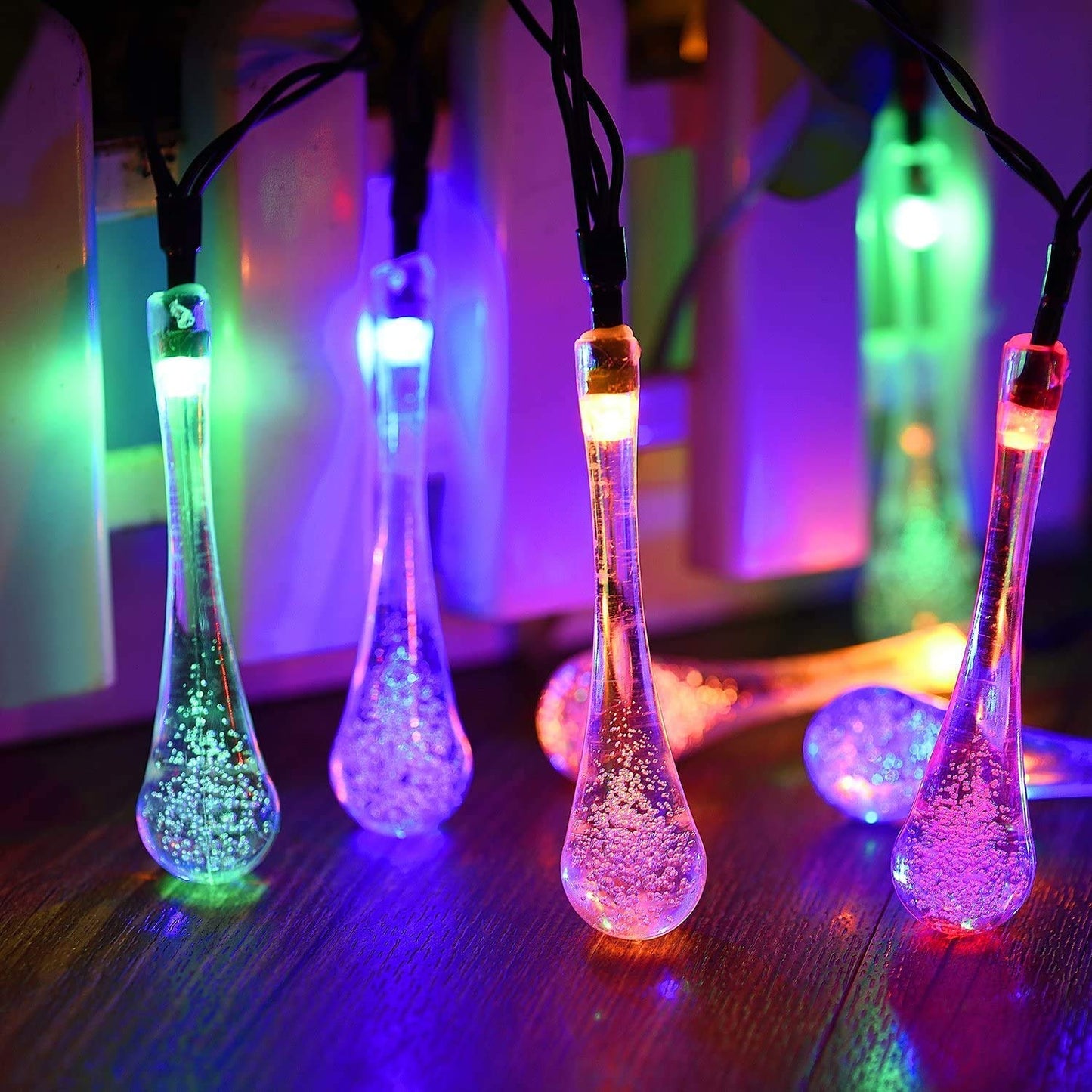  Solar LED light string lights adding a magical touch to the garden.