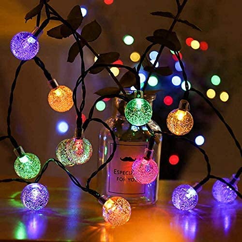  Colorful lights wrapped around a vase, creating a festive and vibrant display.