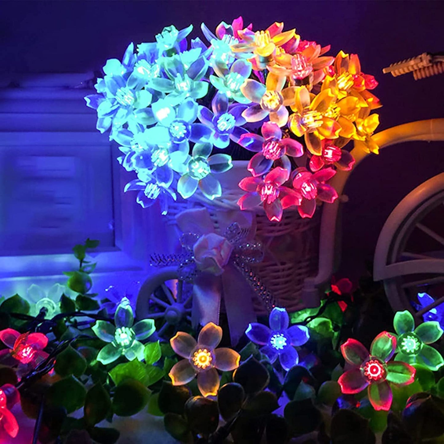 A vibrant vase brimming with colorful flowers, illuminated by soft lights, creating a cheerful and inviting atmosphere.