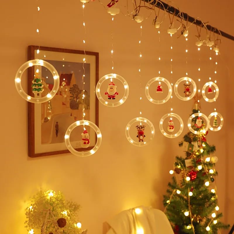 A festive room with Christmas decorations and twinkling lights.