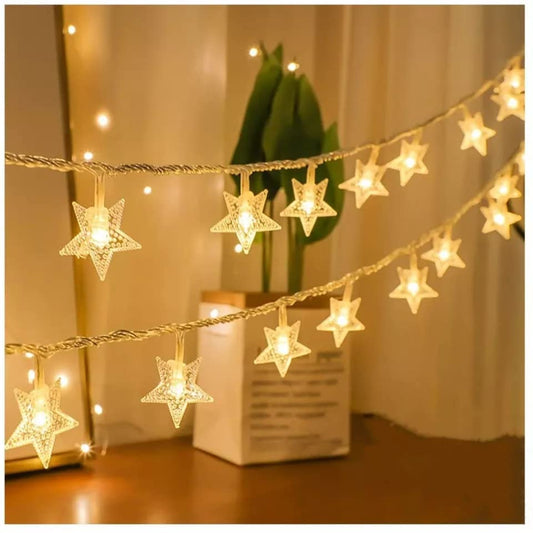  String of star lights glowing in the dark, perfect for adding a magical touch to any room decor.