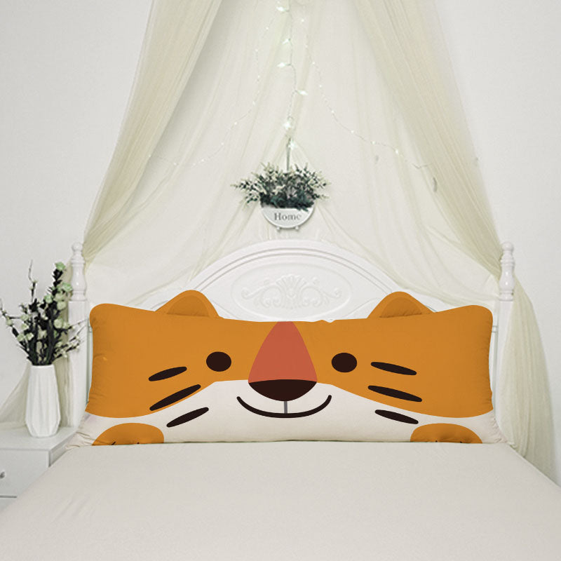  A cozy bed with a pillow featuring a cute Tiger face design.