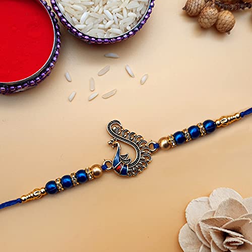 Rakhi with blue beads and gold thread, symbolizing love and protection between siblings.